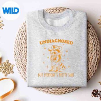UndiagnosedButEveryonesPrettySureCowRaccoonsweater